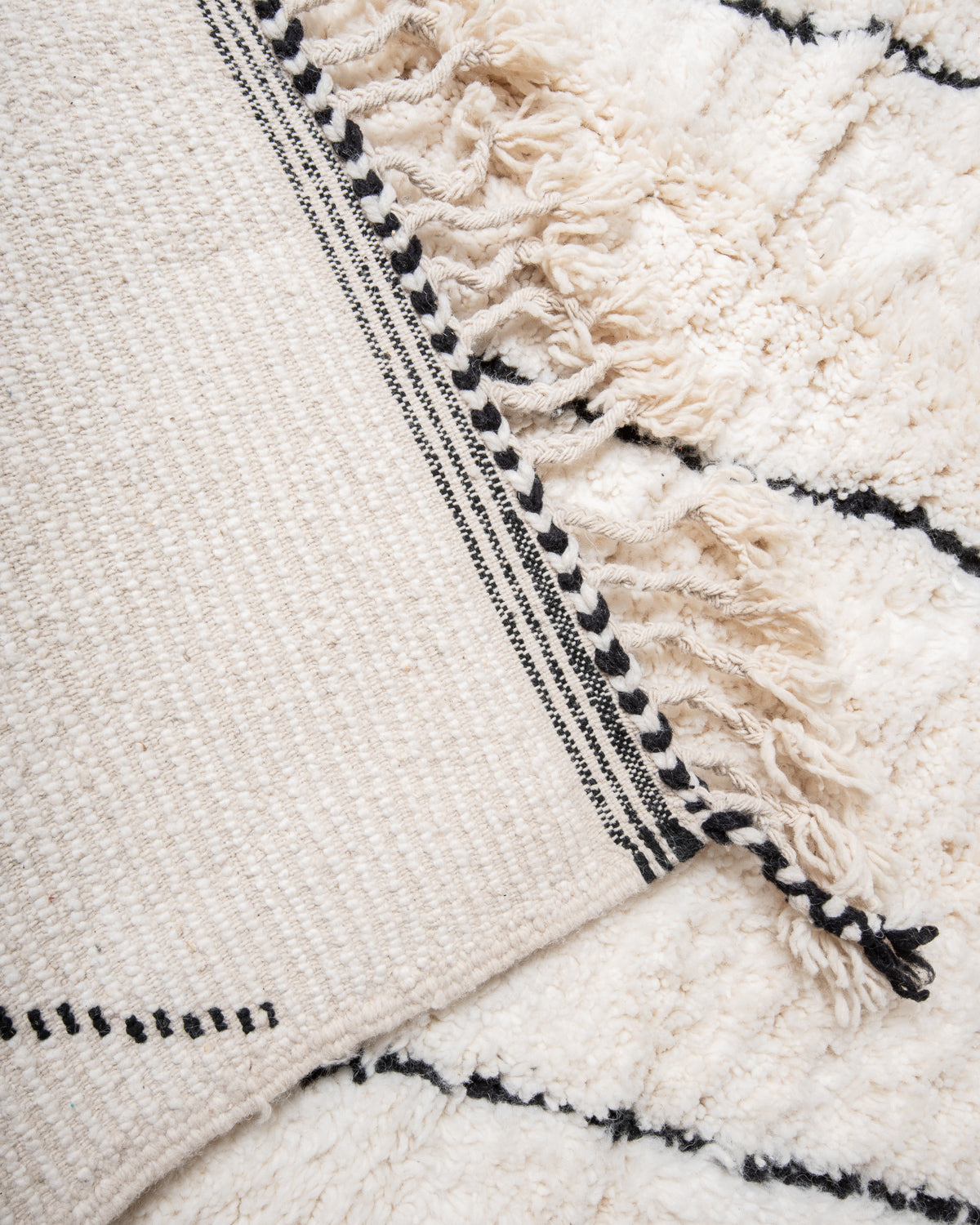 Modern, designer, handcrafted Berber rug from Morocco. Beniourain carpet with beautiful colours and patterns and fluffy wool texture.
